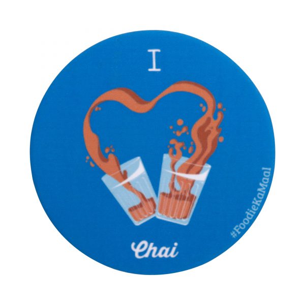blue colour badge or fridge magnet with i love chai printed on it